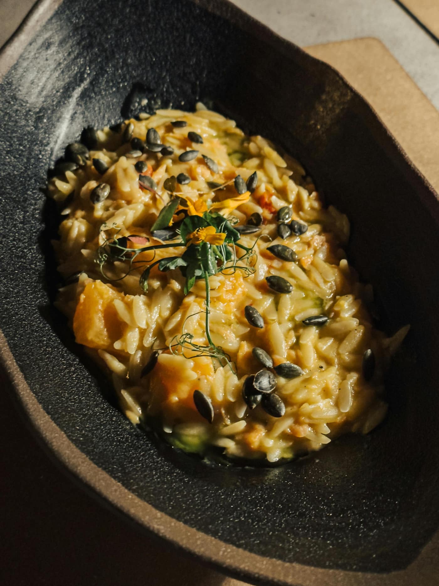 Baked orzo in a serving dish.