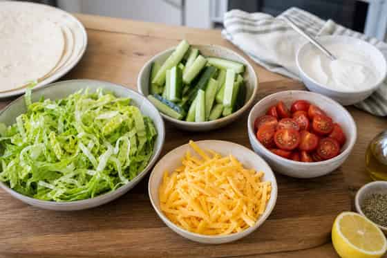 Chicken Lemon Cheddar Salad Wraps with Crisp Lettuce cooking step 3: Prepare the salad.