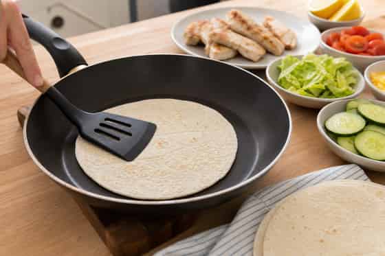 Chicken Lemon Cheddar Salad Wraps with Crisp Lettuce cooking step 5: Warm the wraps.