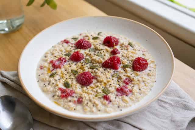 Raspberry Oat Pots with Pumpkin Seeds.