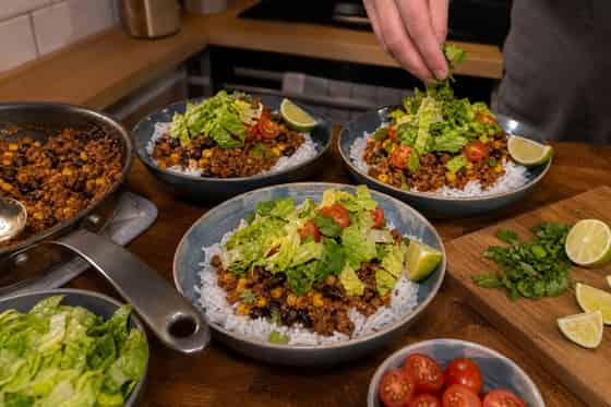 Beef Taco Rice Bowls with Lime Lettuce cooking step 6: Build the bowls.