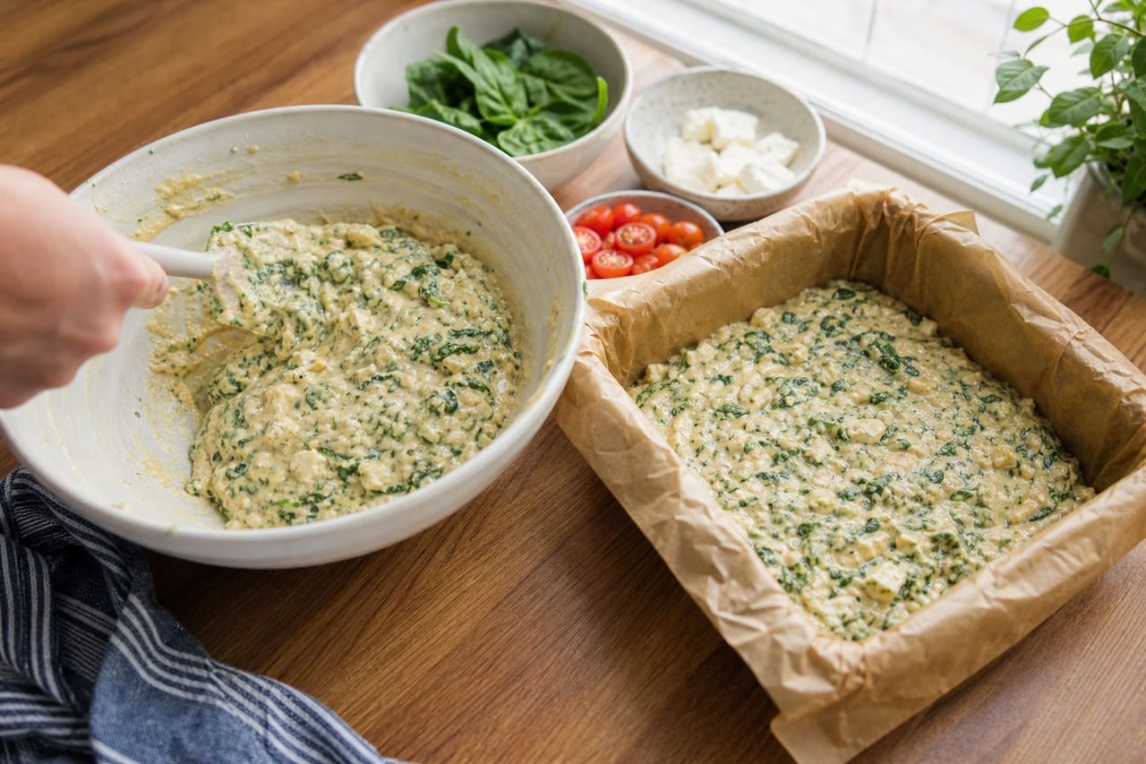 Golden Spinach Feta Breakfast Slices with Mustard Tomato cooking step 3: Make the batter.