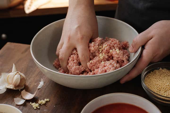 Turkey Meatball Orzo Bake cooking step 1: Heat and season.