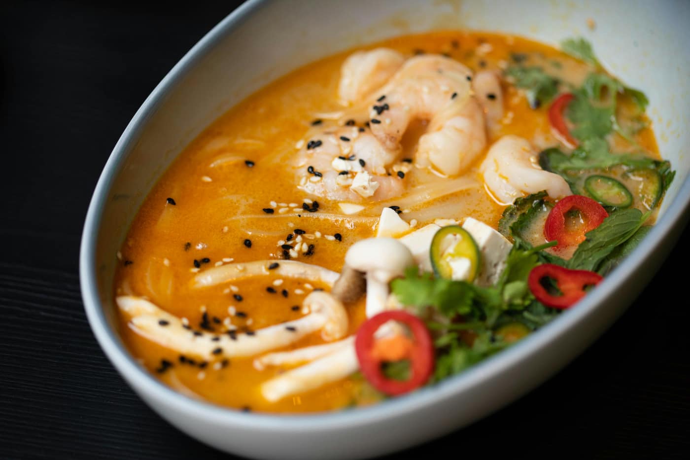 Coconut prawn curry served with fluffy rice.